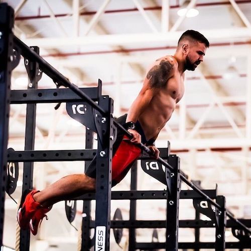 Athlete lifting weights at Bua CrossFit Dublin, showing how to gain muscle with CrossFit through functional strength training.